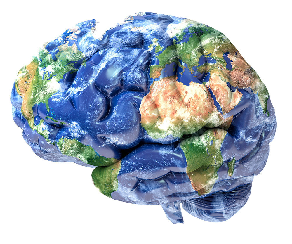 Kuvassa aivot, joiden pinnalla maapallon kartta.